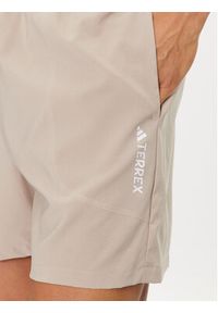 Adidas - adidas Szorty sportowe Terrex Multi HZ6308 Beżowy Regular Fit. Kolor: beżowy. Materiał: syntetyk. Styl: sportowy #6