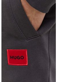 Hugo - HUGO spodnie dresowe bawełniane kolor szary melanżowe. Kolor: szary. Materiał: bawełna, dresówka. Wzór: gładki, melanż #2