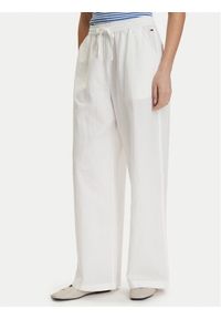Tommy Jeans Spodnie materiałowe DW0DW22285 Biały Loose Fit. Kolor: biały. Materiał: len #1