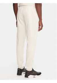 EA7 Emporio Armani Spodnie dresowe 7M000676 AF16718 U1086 Beżowy Regular Fit. Kolor: beżowy. Materiał: syntetyk #3