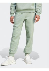 Adidas - adidas Spodnie dresowe IR8361 Zielony Regular Fit. Kolor: zielony. Materiał: bawełna