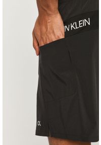 Calvin Klein Performance - Szorty. Okazja: na co dzień. Kolor: czarny. Materiał: tkanina, materiał, dzianina. Wzór: gładki. Styl: casual #4