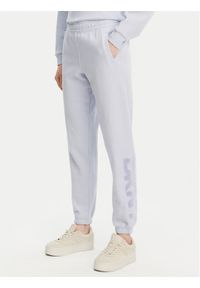 DKNY Sport Spodnie dresowe DP5P3585 Błękitny Regular Fit. Kolor: niebieski. Materiał: syntetyk, bawełna #1