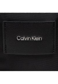 Calvin Klein Saszetka Ck Must Reporter Xs W/PcktK50K509116 Czarny. Kolor: czarny. Materiał: materiał #5