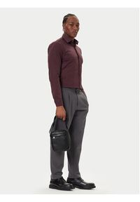 Calvin Klein Saszetka Emblem Emboss Reporter LV04D3204G Czarny. Kolor: czarny. Materiał: skóra