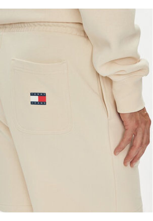 Tommy Jeans Szorty sportowe New Classic Beach DM0DM21781 Beżowy Relaxed Fit. Kolor: beżowy. Materiał: bawełna. Styl: sportowy