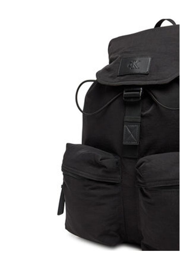 Calvin Klein Jeans Plecak Metro Nylon Flap Bp 43 Ny LV04G3085G Czarny. Kolor: czarny. Materiał: materiał