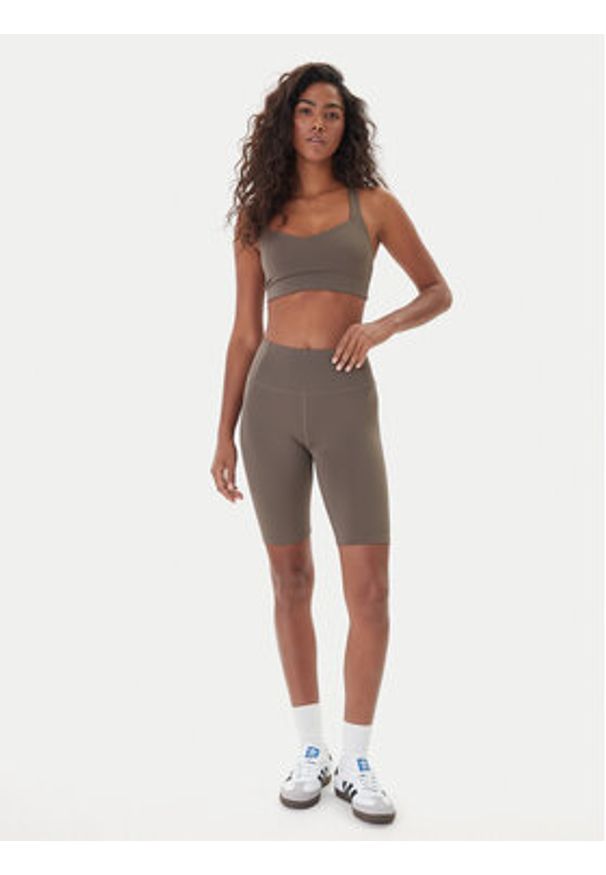 GIRLFRIEND COLLECTIVE - Girlfriend Collective Szorty sportowe Float 4023 Beżowy Slim Fit. Kolor: beżowy. Materiał: syntetyk