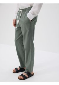 Reserved - Bawełniane spodnie jogger - jasnozielony. Kolor: zielony. Materiał: bawełna