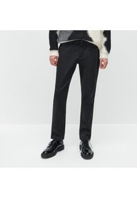 Reserved - Gładkie spodnie slim fit - Czarny. Kolor: czarny. Wzór: gładki #1