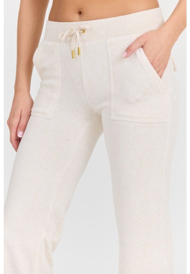 Juicy Couture - JUICY COUTURE Damskie beżowe dresowe spodnie Del Ray Gold HW. Kolor: beżowy. Materiał: dresówka. Długość: długie