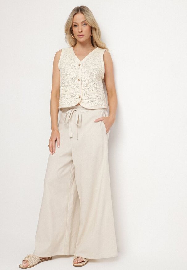 Born2be - Beżowe Szerokie Spodnie z Bawełny z Wysokim Stanem z Troczkiem Nelseli. Okazja: na co dzień. Stan: podwyższony. Kolor: beżowy. Materiał: bawełna. Styl: casual