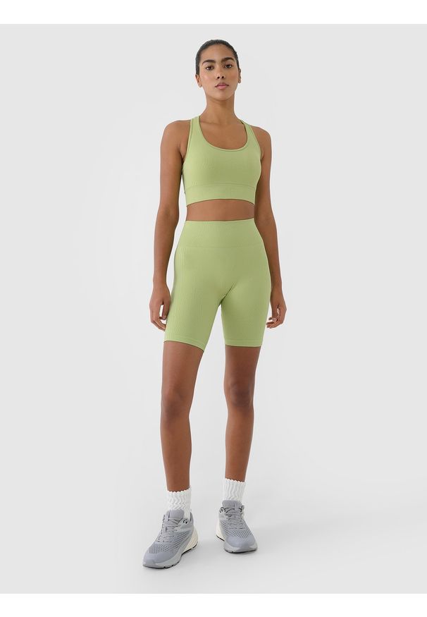 4f - 4F Legginsy kolarki bezszwowe treningowe damskie - zielone M/L. Stan: podwyższony. Kolor: zielony. Materiał: dzianina, włókno, syntetyk, materiał, elastan. Długość: krótkie. Wzór: gładki, ze splotem, jednolity. Sport: fitness