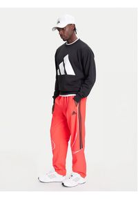 Adidas - adidas Spodnie dresowe Teamgeist adicolor JW5871 Czerwony Loose Fit. Kolor: czerwony. Materiał: syntetyk #5