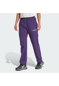 Adidas - Spodnie Terrex Multi Liteflex. Kolor: fioletowy. Materiał: materiał. Sezon: lato. Sport: turystyka piesza #1
