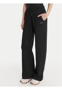 Guess Spodnie dresowe V6RB17 K9V31 Czarny Regular Fit. Kolor: czarny. Materiał: bawełna #1