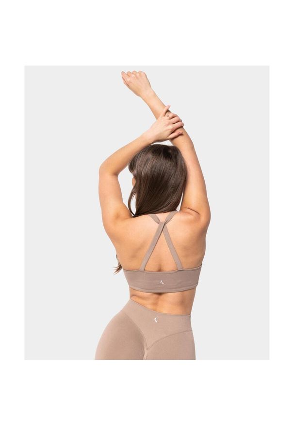 Biustonosz bezszwowy Carpatree Accolade beżowy. Kolor: beżowy. Wzór: aplikacja. Sport: joga i pilates