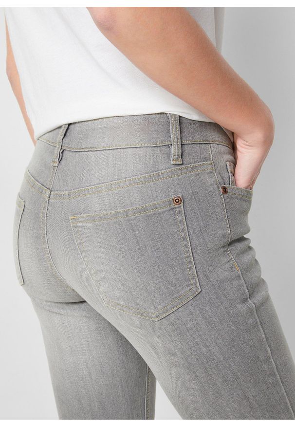 bonprix - Wygodne dżinsy ze stretchem o kroju bootcut, mid waist. Kolor: szary