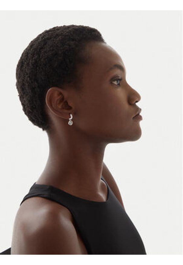 Guess Kolczyki Huggie Me JUBE03 147JW Srebrny. Materiał: srebrne. Kolor: srebrny