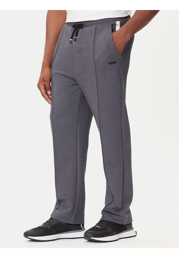 BOSS Spodnie dresowe TL 50543145 Szary Relaxed Fit. Kolor: szary. Materiał: syntetyk, bawełna