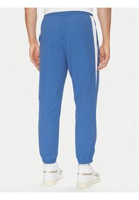 Reebok Spodnie dresowe 100215278 Niebieski Regular Fit. Kolor: niebieski. Materiał: syntetyk #3