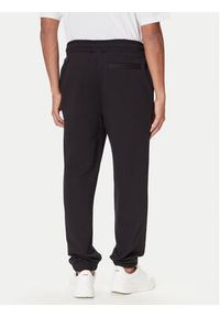 Hugo - HUGO Spodnie dresowe Nyrotro 50549779 Czarny Loose Fit. Kolor: czarny. Materiał: bawełna #5