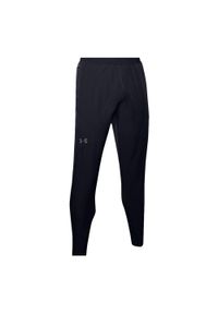 Spodnie dresowe slim fit Under Armour Flex Woven. Kolor: wielokolorowy, szary, czarny. Materiał: dresówka. Sport: fitness #1