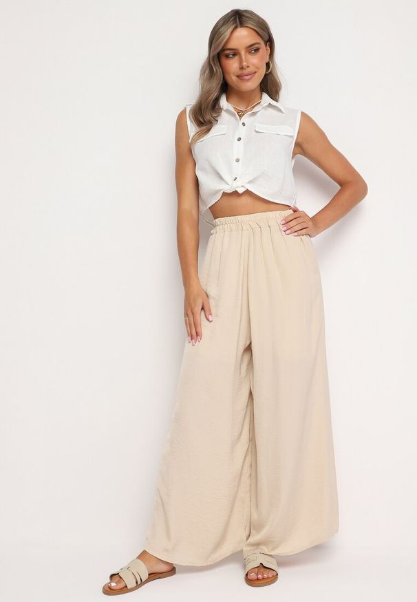 Born2be - Jasnobeżowe Szerokie Spodnie z Gumką w Pasie Agate. Kolor: beżowy. Materiał: wiskoza