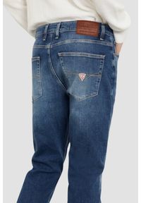Guess - GUESS Granatowe męskie spodnie jeansowe Angels, Rozmiar 33/34. Kolor: niebieski #4