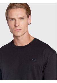 Calvin Klein T-Shirt K10K110669 Czarny Regular Fit. Kolor: czarny. Materiał: bawełna