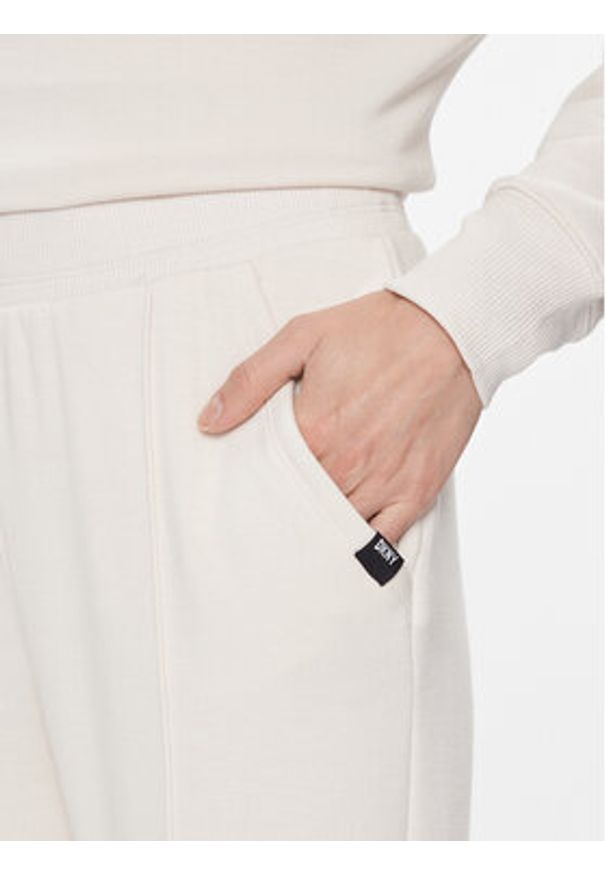 DKNY Sport Spodnie materiałowe DP3P3339 Écru Wide Leg. Materiał: materiał, syntetyk. Styl: sportowy