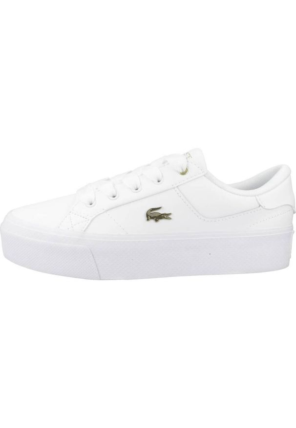 Tenisówki Lacoste Model Ziane Kolor Biały. Kolor: biały, wielokolorowy, żółty. Materiał: tkanina, skóra. Obcas: na platformie. Sport: turystyka piesza