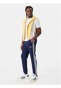 Adidas - adidas Spodnie dresowe 3-Stripes KE3561 Granatowy Slim Fit. Kolor: niebieski. Materiał: syntetyk, bawełna #2