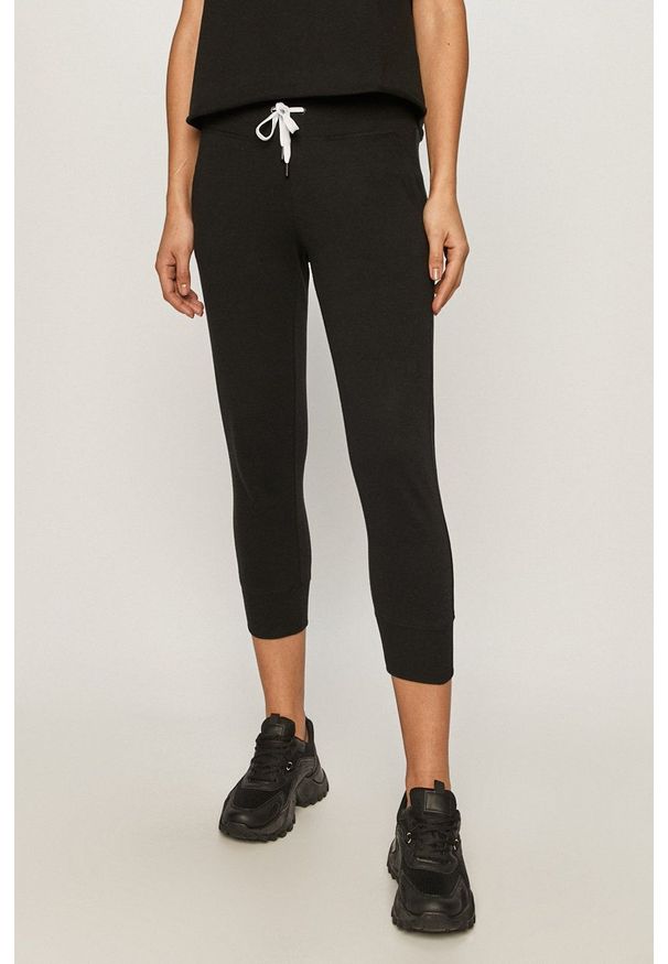 DKNY - Dkny - Spodnie. Kolor: czarny. Materiał: dzianina. Wzór: nadruk