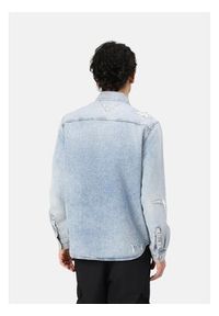 Tommy Jeans Koszula jeansowa DM0DM21362 Niebieski Regular Fit. Kolor: niebieski. Materiał: bawełna
