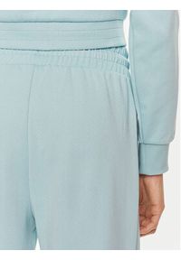 Puma Spodnie dresowe T7 624212 Niebieski Relaxed Fit. Kolor: niebieski. Materiał: syntetyk, bawełna #4
