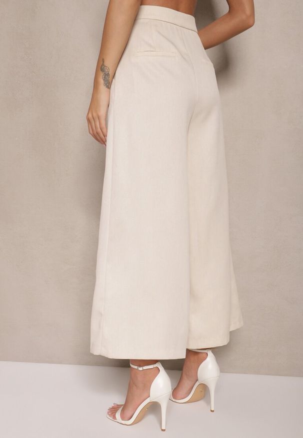 Renee - Beżowe Garniturowe Spodnie o Fasonie Culottes Adeana. Okazja: na spotkanie biznesowe, na co dzień. Kolor: beżowy. Styl: biznesowy, klasyczny, elegancki, casual