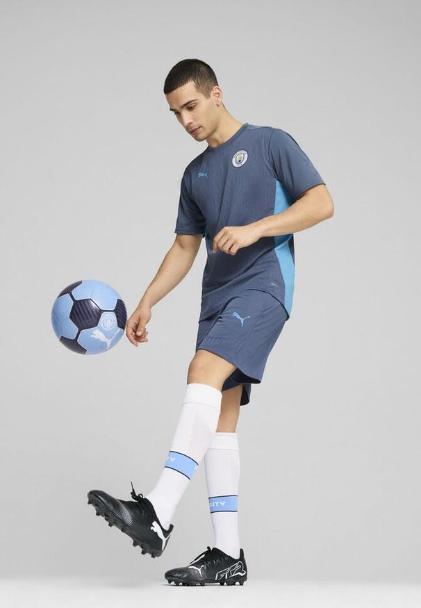 Puma - Męska koszulka treningowa Manchester City PUMA Inky Blue Magic. Kolor: niebieski. Sport: fitness