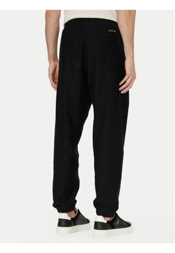 Calvin Klein Jeans Spodnie dresowe LV04RF249G Czarny Regular Fit. Kolor: czarny. Materiał: bawełna