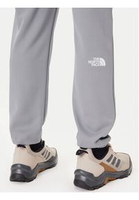 The North Face Spodnie dresowe Reaxion 2.0 NF0A8DRS Szary Regular Fit. Kolor: szary. Materiał: syntetyk #3