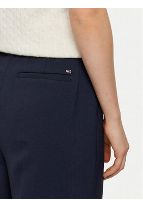 TOMMY HILFIGER - Tommy Hilfiger Spodnie materiałowe WW0WW43875 Granatowy Regular Fit. Kolor: niebieski. Materiał: syntetyk