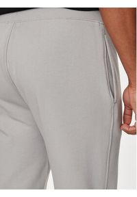 C.P. Company Spodnie dresowe 16CMSP017A005086W Szary Regular Fit. Kolor: szary. Materiał: bawełna