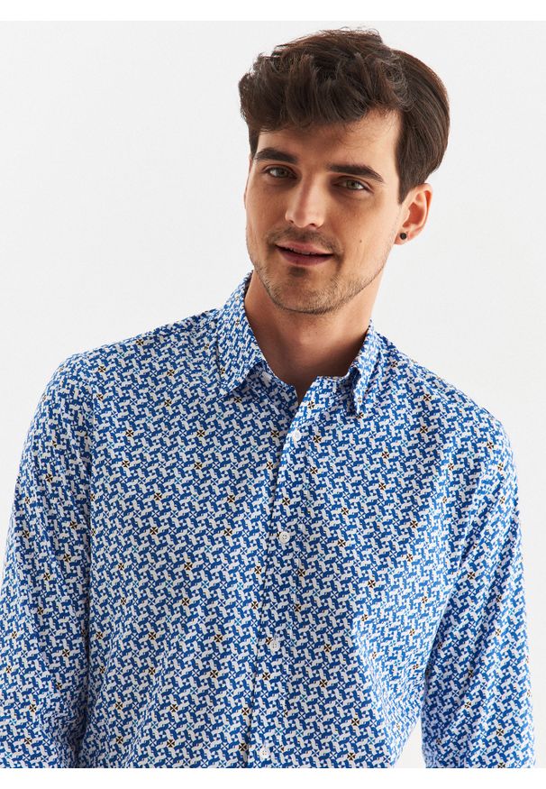 Pako Lorente - PAKO LORENTE – Koszula męska w biało-niebieski mikrowzór. Typ kołnierza: kołnierzyk klasyczny. Kolor: niebieski, biały, wielokolorowy. Materiał: elastan, bawełna. Długość rękawa: długi rękaw. Długość: długie. Styl: klasyczny