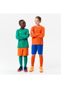 KIPSTA - Spodenki piłkarskie dla dzieci Kipsta Viralto Club. Kolor: pomarańczowy. Materiał: elastan, materiał, poliester, poliamid. Sezon: lato. Styl: sportowy