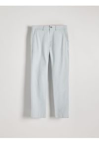 Reserved - Spodnie chino slim fit - jasnoniebieski. Kolor: niebieski. Materiał: tkanina, bawełna