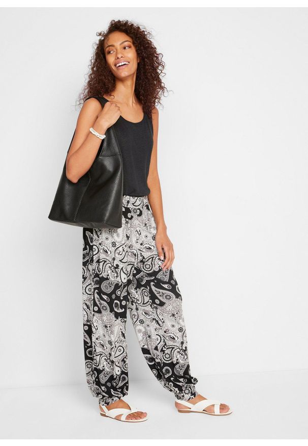 bonprix - Dżersejowe spodnie haremki z lejącej mieszanki wiskozy. Kolor: czarny. Materiał: jersey, wiskoza. Wzór: paisley, nadruk