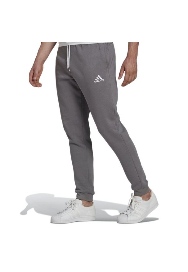 Adidas - Spodnie adidas Entrada 22 Sweat Pants H57531 - szare. Kolor: szary. Materiał: poliester, materiał, dresówka, bawełna