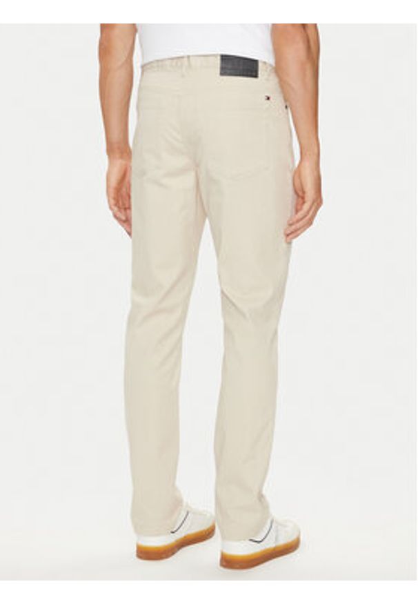 TOMMY HILFIGER - Tommy Hilfiger Spodnie materiałowe Denton MW0MW36429 Beżowy Straight Fit. Kolor: beżowy. Materiał: bawełna