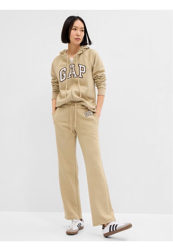 GAP - Gap Spodnie dresowe 430369-11 Beżowy Regular Fit. Kolor: beżowy. Materiał: bawełna, dresówka