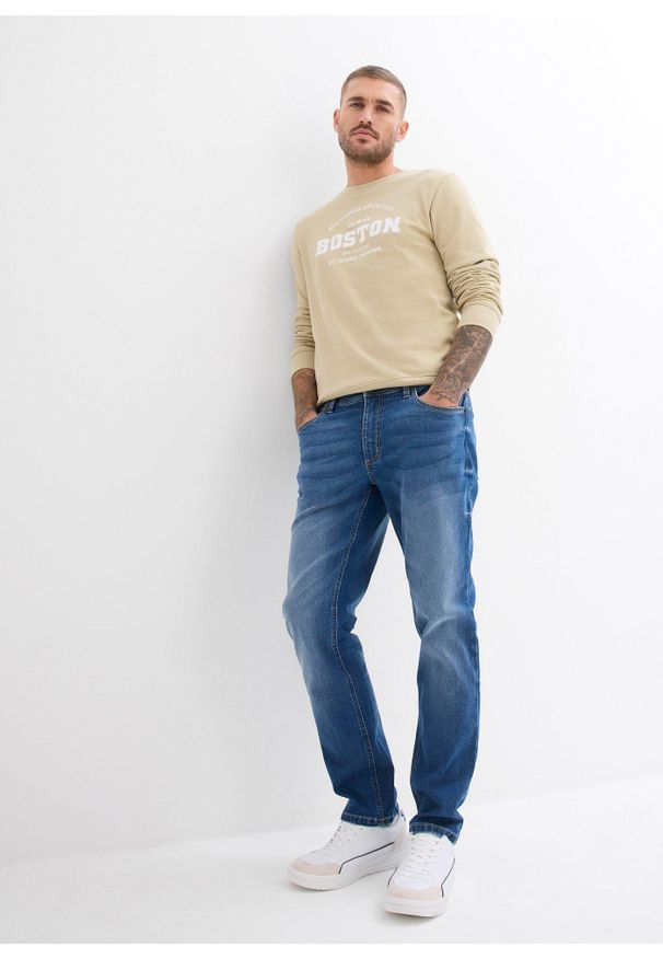 bonprix - Dżinsy regular fit ze stretchem, straight. Kolor: niebieski